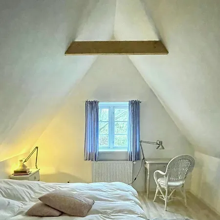 Thatched Half-timbered House On Idyllic *