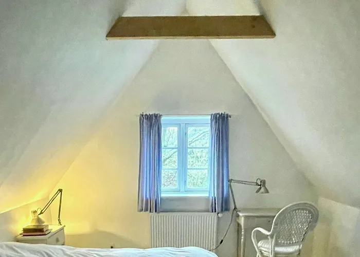 Thatched Half-timbered House On Idyllic *